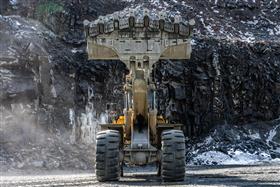 Birdsboro Quarry: A Caterpillar 992K waits to load a Caterpillar 777G with shot rock.