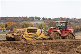 Harrisburg Division: A Case IH Steiger 580 pulls a K-Tec 1228 scraper along one of the cuts.