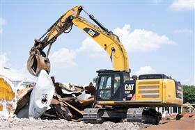 Haines & Kibblehouse, Inc.: A Caterpillar 336F sorts through various metals at a tank farm demolition. 