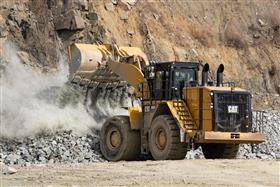 Douglassville Quarry: A Caterpillar 990K sorts shot rock. 