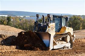 Landis C. Deck & Sons Division: A Caterpillar D6 grades a haul road.