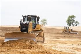 Landis C. Deck & Sons Division: Two Caterpillar D6's grade a pad. 