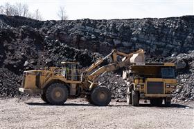 Chalfont Quarry & Asphalt: A Caterpillar 988 loads a Caterpillar 769D with shot rock.