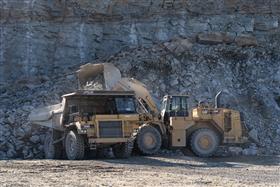 Hawley Quarry: A Caterpillar 988K loads a Caterpillar 769D with shot rock.