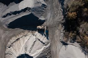 Hawley Quarry: A Caterpillar 980M loads a dump truck with product.