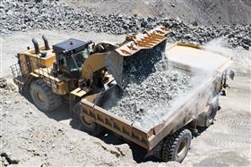 Douglassville Quarry: The Caterpillar 990K loads a 775G with shot rock from an earlier blast.