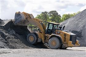 Dagsboro Stone Depot: A Caterpillar 982M stacks material in a stockpile at Dagsboro Stone Depot.