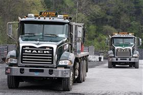 Easton Block & Supply: Two Easton Block & Supply trucks are loaded for delivery.