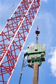 Structures Division: An ICE hammer is used to drive sheet into the ground. 