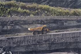 Naceville Quarry: A Komatsu HD605 heads up the haul road to the primary crusher. 