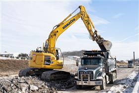 Lehigh Valley Division: A Komastu PC228 loads a Mack Granite triaxle with crushed concrete. 