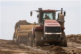 Landis C. Deck & Sons Division: A Case IH 540 QuadTrac and KTec 1228 pan work a cut.