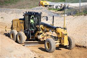 Lehigh Valley Division: A Caterpillar 12M3 grades a new roadway before stone is laid.