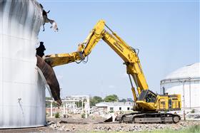 Haines & Kibblehouse, Inc.: A Komatsu PC1250 demolishes an old gasoline storage tank in Philadelphia, PA.