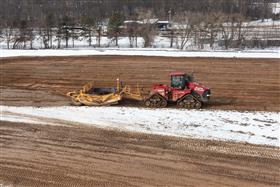 Pottstown Division: A Case IH 580 and KTec 1228 scraper work a cut. 