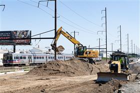 Haines & Kibblehouse, Inc.: A SEPTA local passes by the work site on I-95 in Philadelphia, PA. 