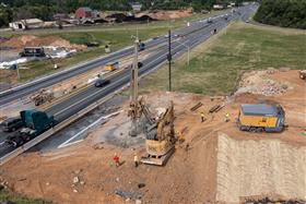 Structures Division: A Structures Division crew drills micropiles for a bridge.