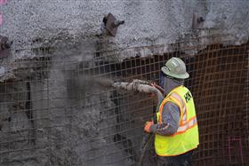 Structures Division: A Structures Division team member sprays shotcrete. 