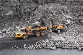 Wilkes-Barre Materials: A Volvo EC750E loads a Volvo A60H with shot rock.